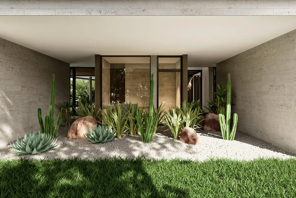 Modern house entrance with desert-inspired landscaping: cacti, agave, rocks, and gravel in a minimalist concrete planter bed.