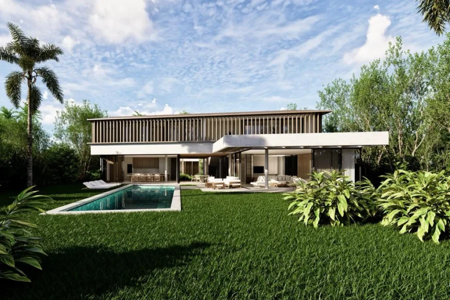 Modern two‑story, flat-roof house with an outdoor lounge and rectangular pool in a lush backyard.