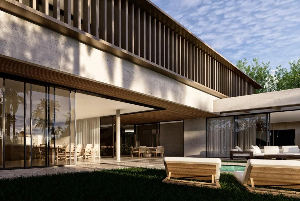 Modern two-story house with glass walls, wooden slats, and an outdoor dining area beside a pool.